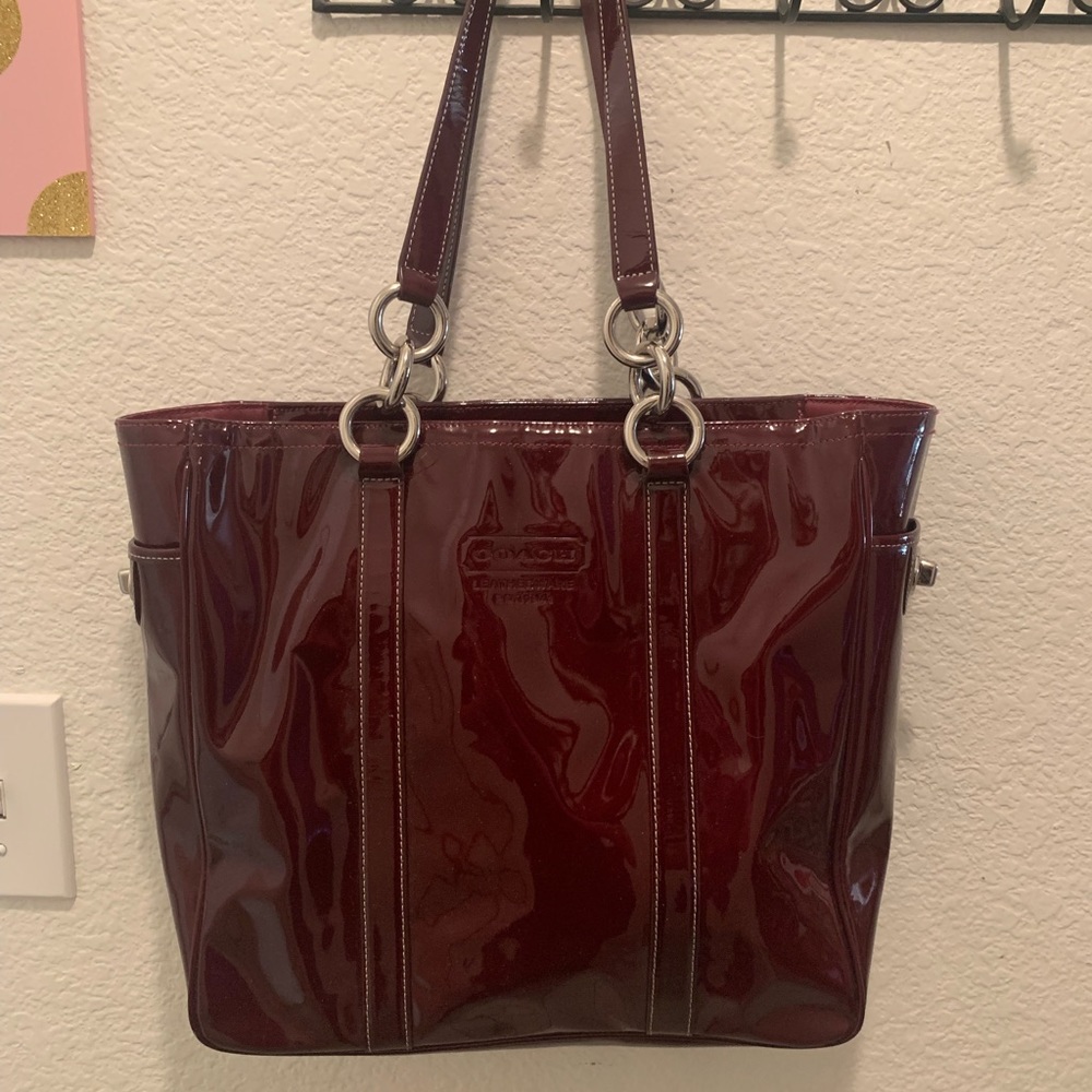 Maroon patent leather Coach bag
